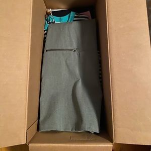 Box of womens clothing.